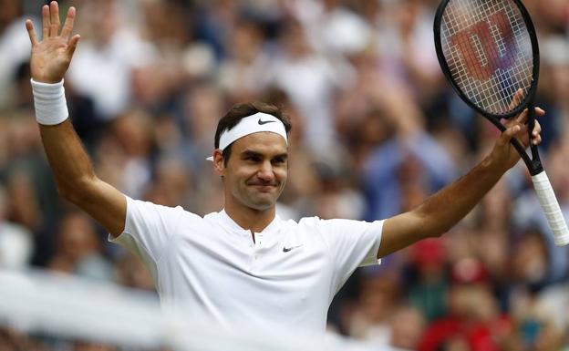 Federer festeja su victoria ante Berdych.