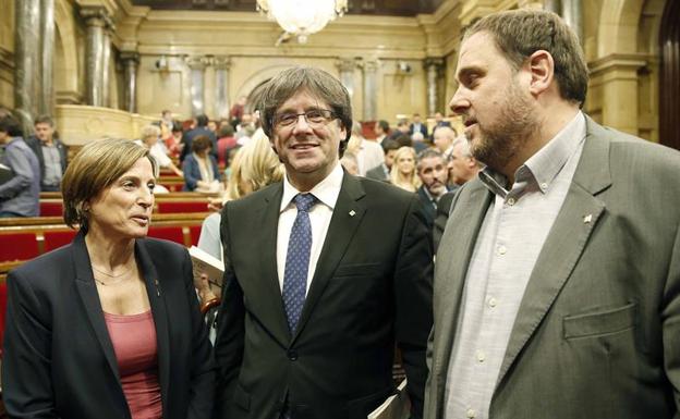Forcadell, Puigdemont y Junqueras./EFE